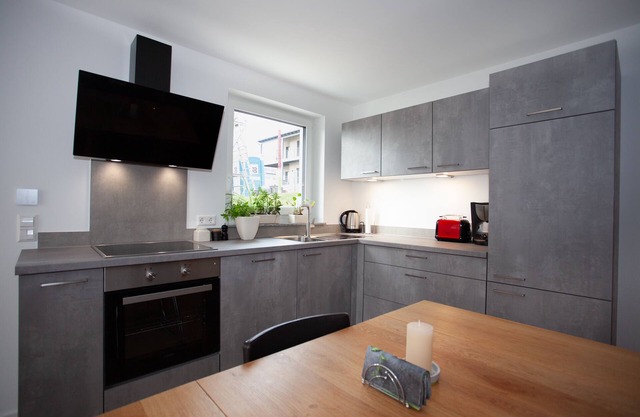 Vacation happiness. Modern vacation apartment with private garden