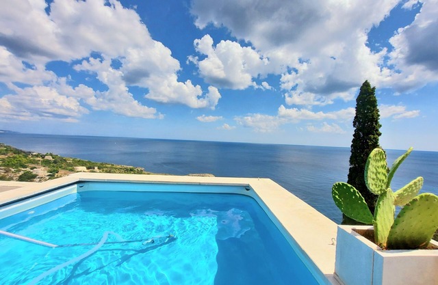 VILLA GIRASOLI ON THE SEA 6 GUESTS SWIMMING POOL of property " VILLE GIRASOLI"
