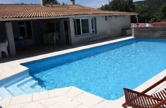 Villa with 10x5 pool on enclosed grounds and covered terraces