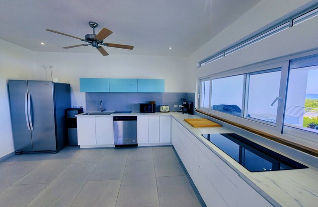 Villa with pool. Sea view. 4 bedrooms, kitchen. Las Terrenas over playa bonita.