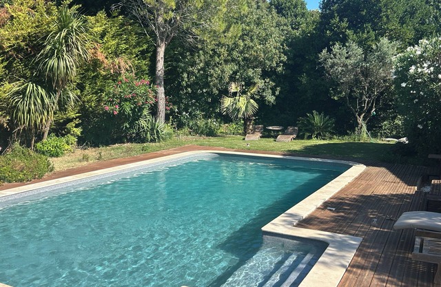 Villa with swimming pool in a large garden dotted with olive trees
