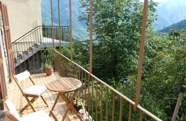 Village house in the mountains, calm, in a picturesque landscape