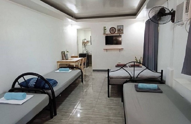 "Walking distance from the Beach Perfect for Couples/Families”Complete Amenities