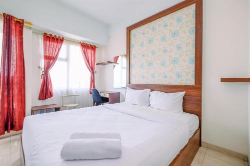 Warm and Cozy Studio at Margonda Residence 3 Apartment By Travelio