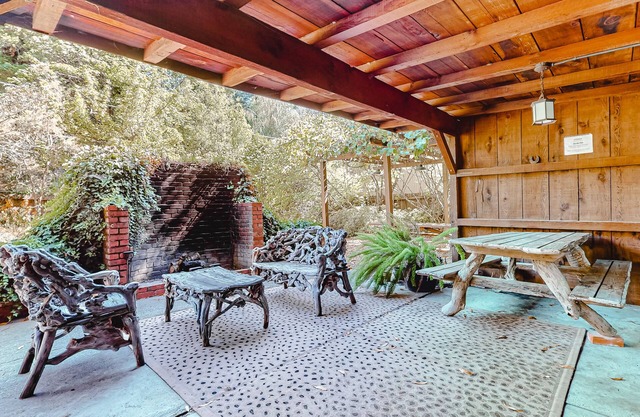 Waterfront cabin with private hot tub, beach access & river views - dog-friendly