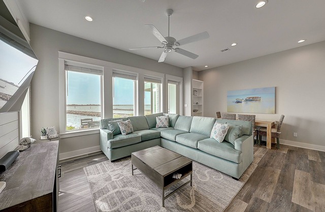 Waterfront haven with Bay views, patio, luxe suites, and shared dock and pool