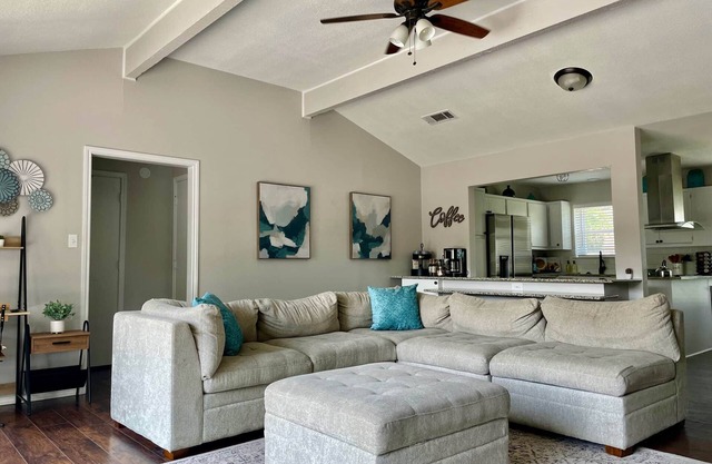 Waterfront home with fire pit, gameroom, and dock