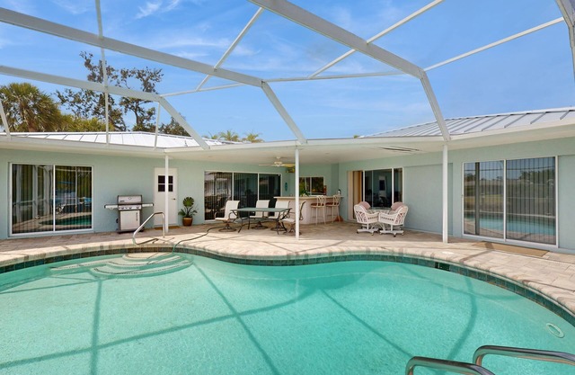 Waterfront home with pool, dock accessible to Gulf, dog friendly with AC & WD