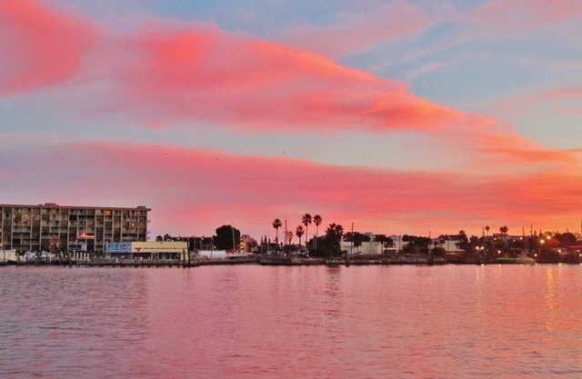 Waterfront Treasure Island Apartment w/Private Patio, Dock & John’s Pass Nearby