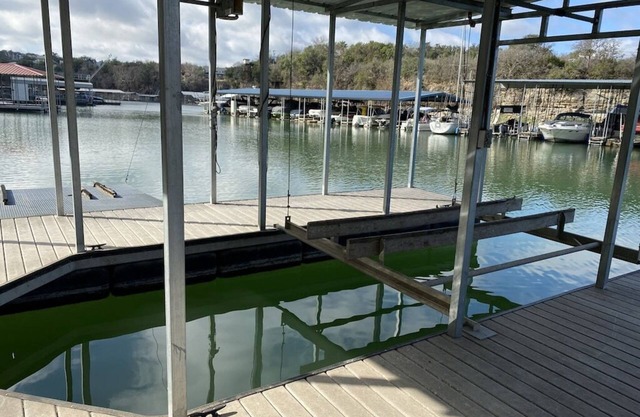 WE HAVE WATER with boat dock AND ramp! EV Charger in garage!