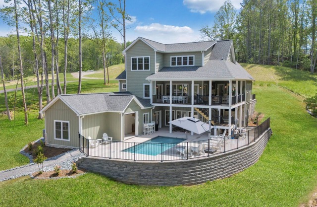 Whispering Pines Estate, Waterfront Luxury w/Covered Verandas + Heated Salt Pool, Hot Tub, Dock!
