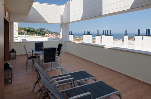 Luanco Apartment | Stylish Ático Nautilus II with Spacious Terrace & Pet Friendly