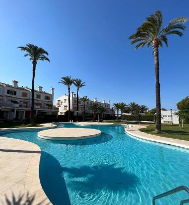 Almadrava Beach Apartment | Beachfront Retreat with Pool Access in Denia