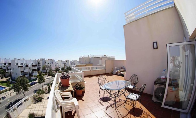 Retamar Apartment | Pet-Friendly Ático with Terrace in El Toyo - Family Fun Awaits