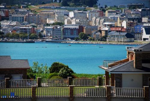 Barreiros Apartment | Scenic Ático with Ocean Views and Pool Access