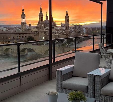Barrio de Jesus Apartment | Stunning Ático with Spectacular Views and Hot Tub Access