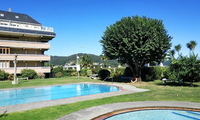 Covas Apartment | Oceanfront Ático Primera Línea with Pool & Pet-Friendly Stay