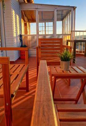 Gijon-Este Apartment | Inviting Ático with Terrace near Beach and Fútbol Events