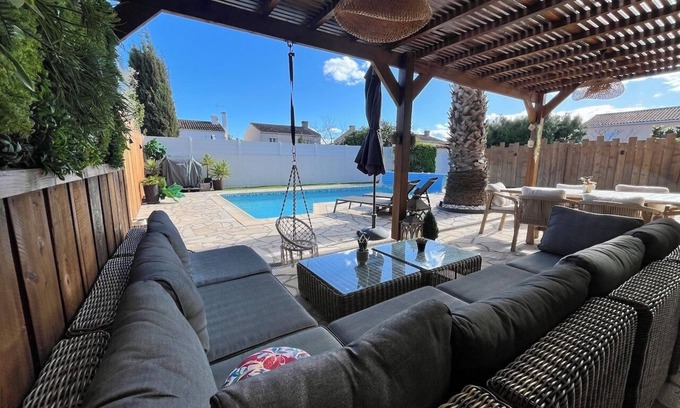 Lattes Villa | Elegant Villa with Pool Steps from the Beach