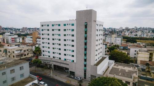 Calafate Hotel | Pet-Friendly Ímpar Suítes Expominas - 4-Star Comfort Awaits