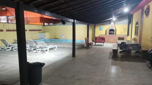 Tamoios House | Oceanfront Haven: Family-Friendly with Pool & Ocean Views