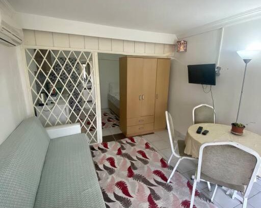 Lara Apartment | Garden Level Retreat with Private Beach Access