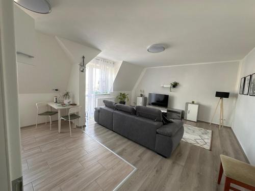 Halle Apartment | Experience Serenity Over the Rooftops of Halle