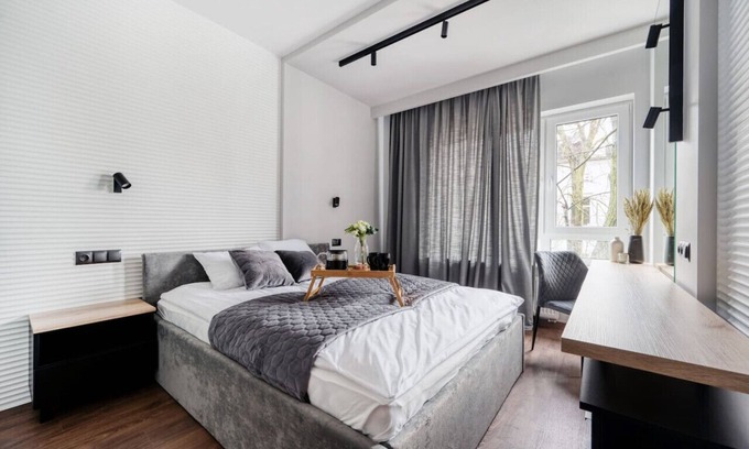 Lodz Apartment | Modern Łódź Prestige Suites with Parking & Family Amenities
