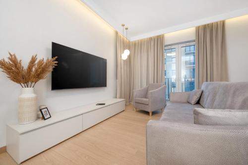 Lodz Apartment | Experience Comfort at Łódź Prestige Suites with Office Space