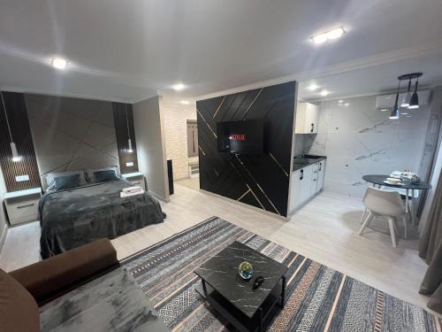 Karagandy Apartment | Child-Friendly Retreat at Алиханова 10А for Your Stay