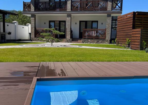 Skole Apartment | Mountain Crystal: Rated 9.9/10 with Oceanfront Pool Access