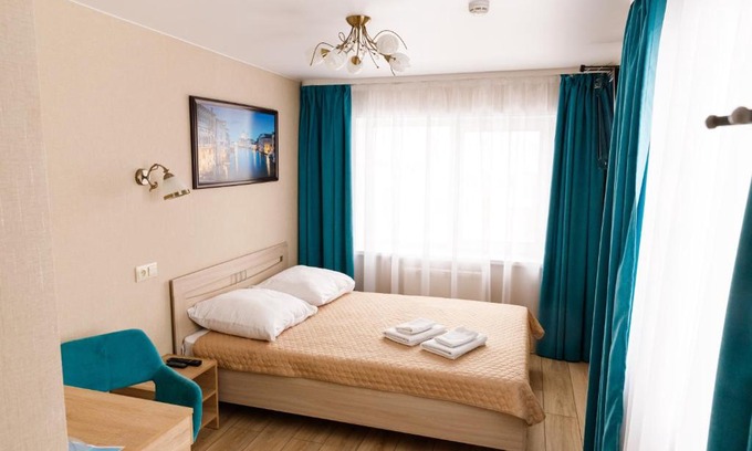 Ustinovskiy Hotel | Delightful Дельфин Hotel with Hot Tub & Kitchen Amenities