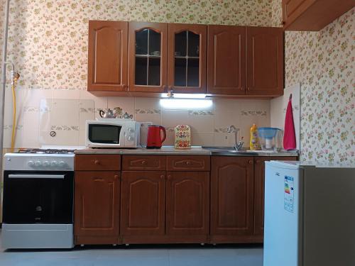 Aktau Apartment | Cozy Retreat: Pet and Child Friendly Stay Awaits You