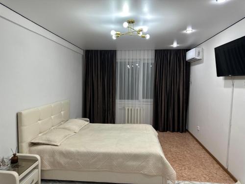 Taldykorgan Apartment | Exceptional Коктем 16: Family-Friendly Comfort Awaits