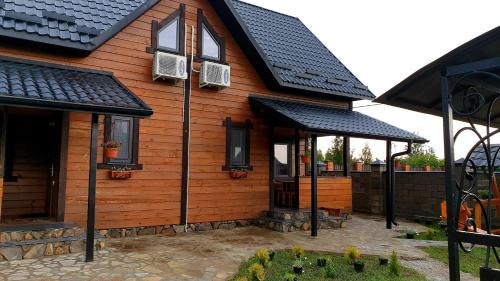 Volyn Oblast House | Pet-Friendly Oasis at Садиба For Rest with Ocean Views