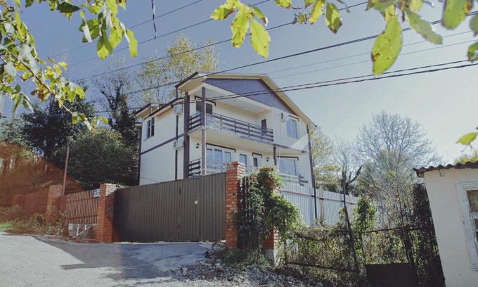 Dzhubga House | Tranquil Courtyard: Pet-Friendly Stay with Hot Tub