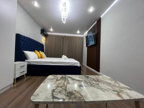 Kyzylorda Apartment | Cozy Downtown Apartments with Pool and Family-Friendly Perks
