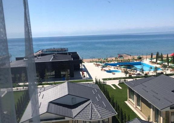 Korumdu Apartment | Oceanfront Bliss at ЦО Novel Иссык-Куль - 9.7/10 Rated