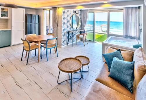 Haifa Apartment | Beachside Bliss: 4-Star Retreat with Jacuzzi & Ocean Views