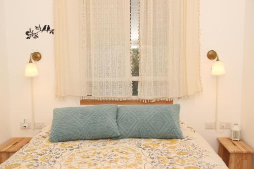 Talmei Yosef Apartment | Experience נצר - Rustic Village Lodging with Ocean Views