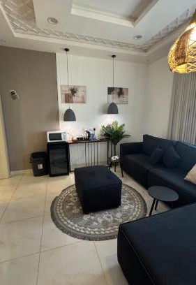 Jizan Apartment | استديو بسرير ماستر بالاضافة لغرفة بسريرين