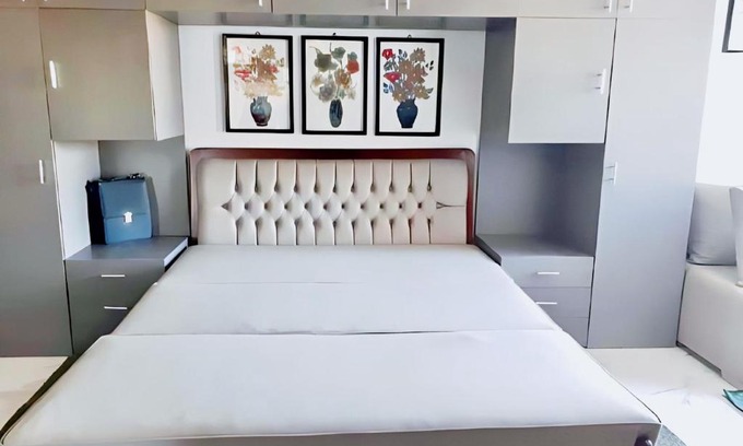 Al-Manasrah Apartment | Relax in Porto Said Studio with Pool and Oceanfront Views