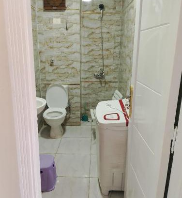 Ad-Dab'ah Apartment | Discover العلمين: Family-Friendly Escape with Pool Access
