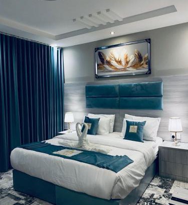Qurish Street Hotel | Discover Comfort at فندق زهرة الربيع - Family-Friendly Stay