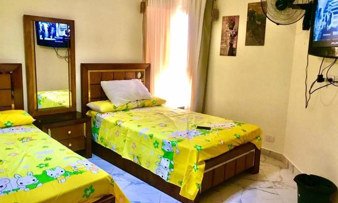 Al-Manasrah Apartment | Discover Relaxation at شاليه ببورتو سعيد with Pool Access