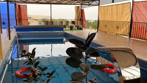 Jordan Ski Chalet | Discover شاليه جبال سوف: Family-Friendly with Pool Access