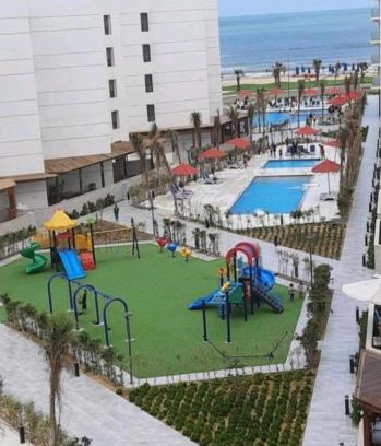 Al-Manasrah Apartment | Cozy Chalet with Private Garden at Port Said Resort