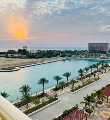 Bay La Sun Apartment | Baylasun View: Oceanfront Retreat with Pool & Family-Friendly