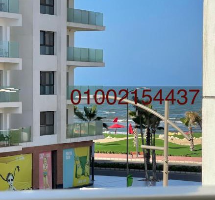 Al-Manasrah Apartment | Discover Porto Said Resort: Oceanfront Comfort & Pool Access