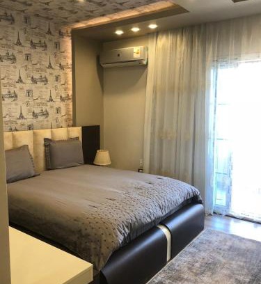 The 5th Settlement Apartment | Inviting Hotel Apartment with Pool and Family-Friendly Amenities